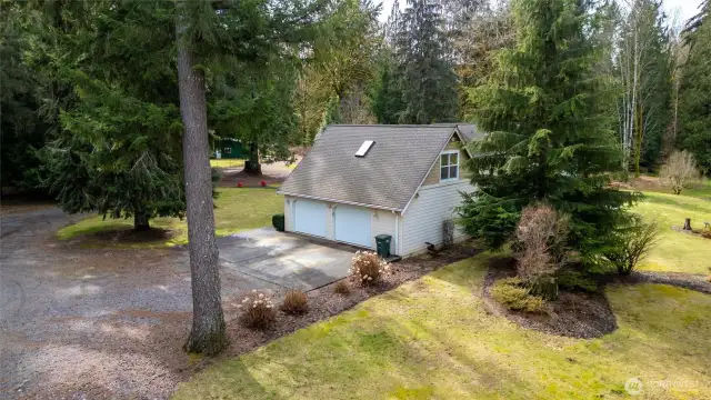 A view of the large 2 door garage that is attached to the home.