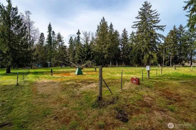 Over half of the property is electric fenced, plus there is a powered rotating walker for horses. Heated water troughs in the fenced area too.