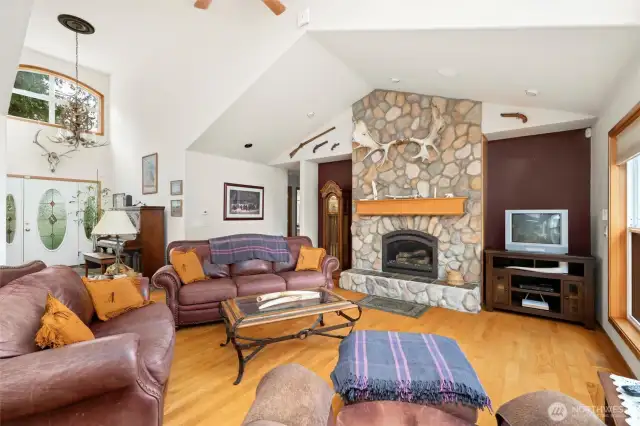 Step inside to the huge great room with vaulted ceilings.