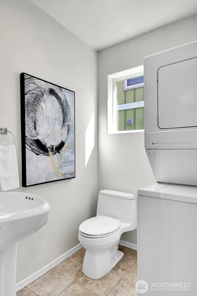 Powder room & laundry on main.