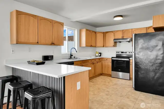 Brand new quartz counters, appliances and faucet.