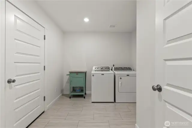Utility room with door to garage