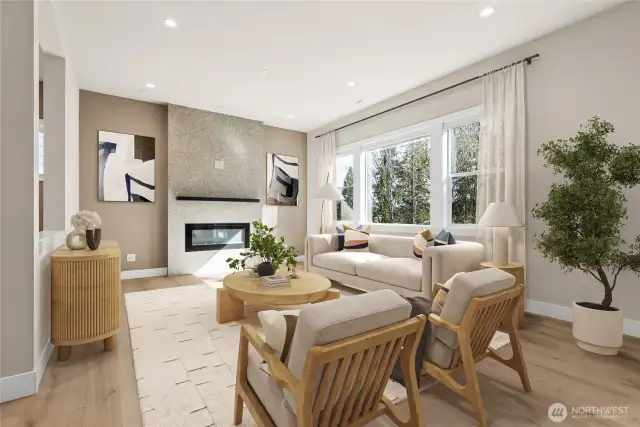 Open plan living concept with oversized windows, luxury automatic blinds and hard surfaces throughout the main living areas