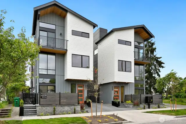 8333A is the home on the left in this photo. Don't miss the fully fenced patio area access through a slider from the main floor living room. There's also a balcony off of the primary suite and a rooftop deck as well.