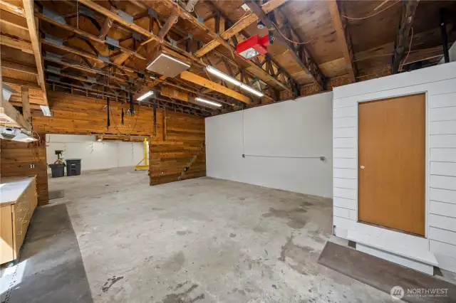 HUGE shop with 1/2 bath. Maybe this is your art room or ??? you decide!