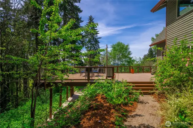 Side Yard with access to deck, kitchen and main floor.