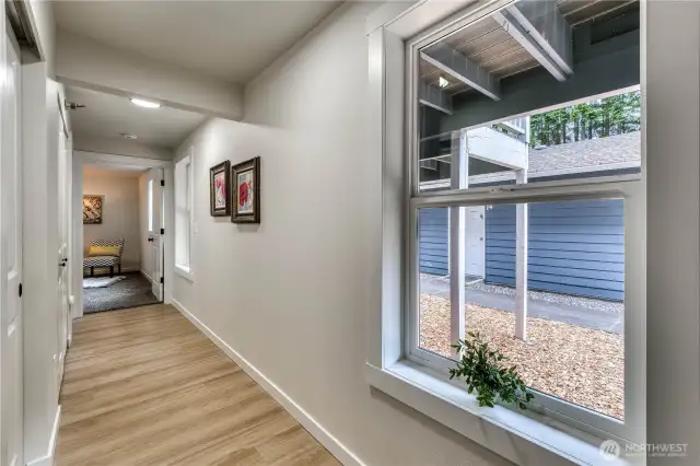 Entry and hall leading to bedrooms.