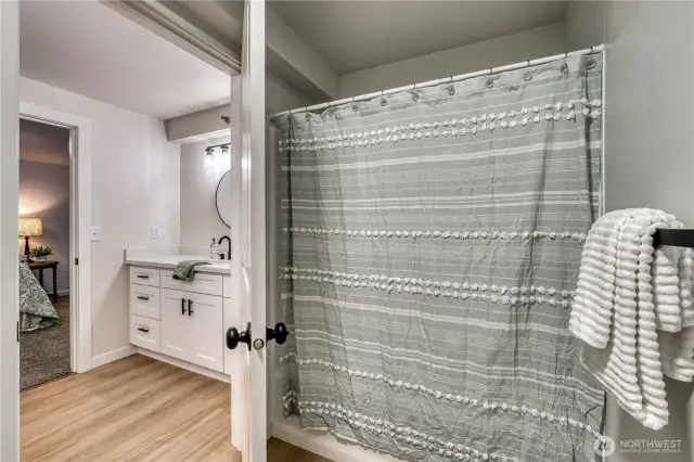 Shower/tub that has been completely resurfaced.