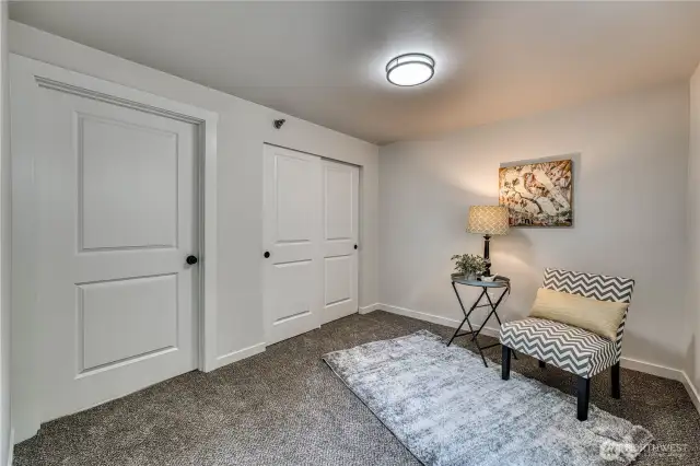 Second bedroom with new carpet, doors, paint, lighting and more....