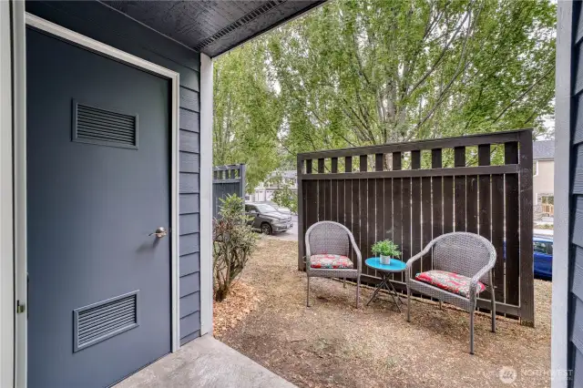 Furnace/Hot water heater room with sitting area.