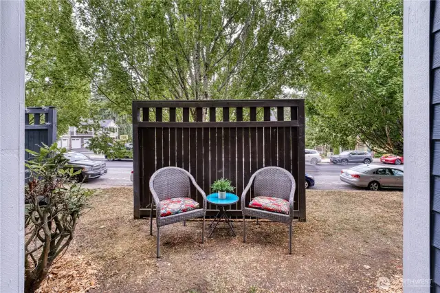 Privacy fence and sitting area. Easy walk out to sidewalks for a stroll.