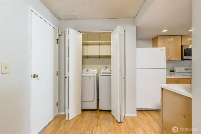 Laundry facilities conveniently located between the kitchen and garage. Washer & dryer stay!