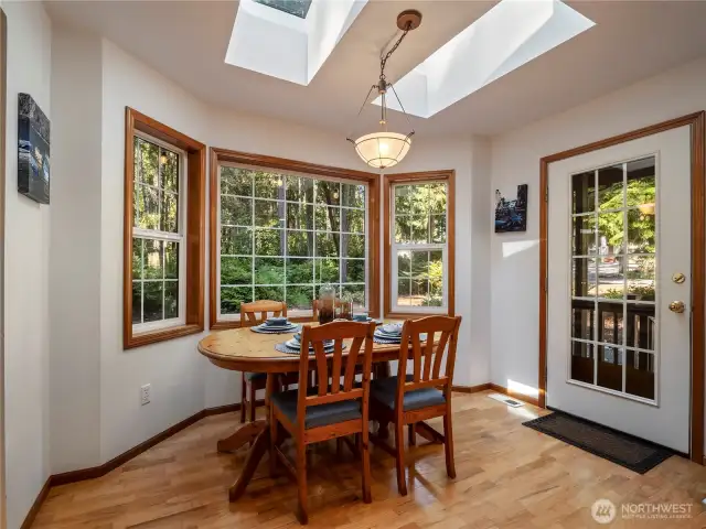 Enjoy dining with a view to the woods behind you where you can see deer, raccoons, and many birds.