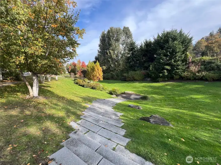 Multiple parks in walking distance!  Walk 2.5 blocks to 30th and Denny to discover this lovely park with play space (out of frame), or head west on Howell to access Plum Park.