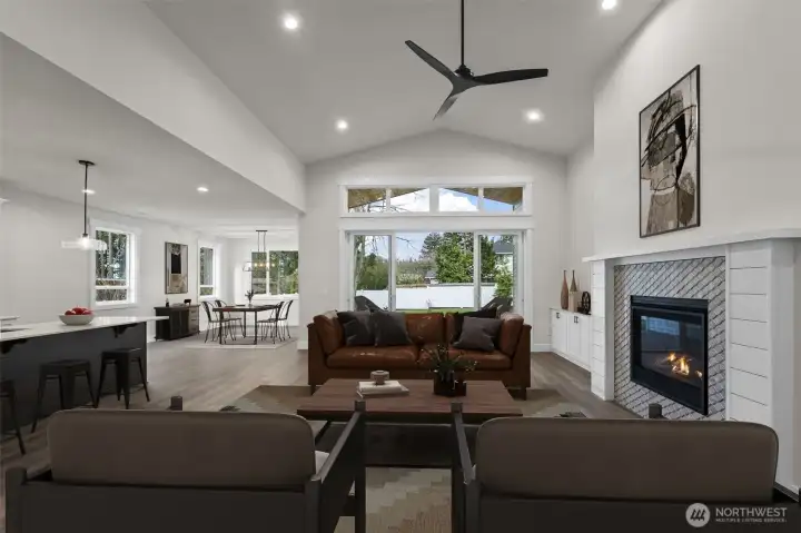 Open concept great room with vaulted ceilings