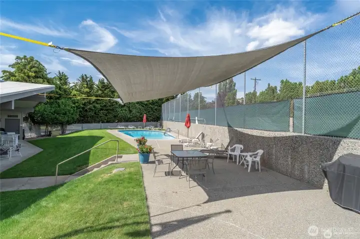 Pool and sunscreen just across driveway