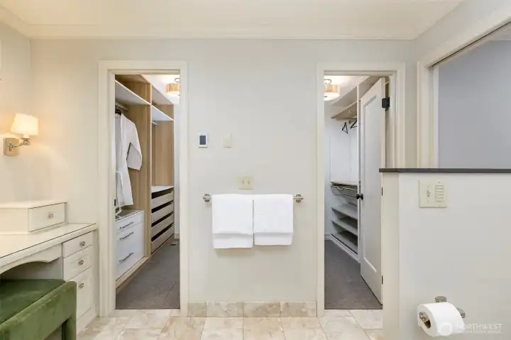 Two walk-in closets with built-in systems
