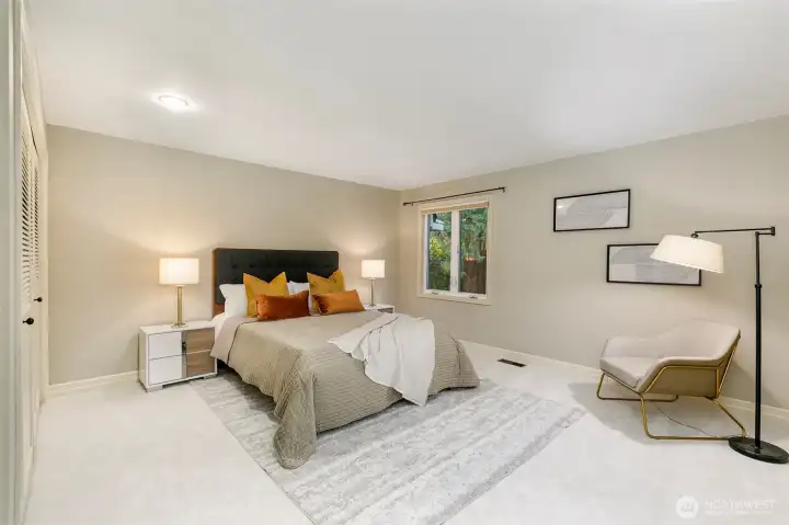 Bedroom # 3 second suite with attached continental bathroom overlooking lush yard