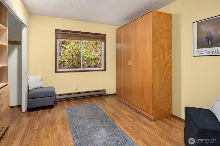 Second bedroom includes a murphy bed and built in cabinet storage in the closet. This room is ideal for office, hobbies or guest suite!