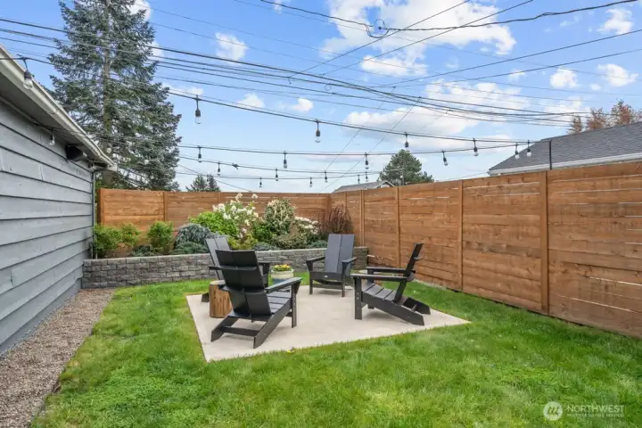 Back yard conversation area perfect for a fire pit