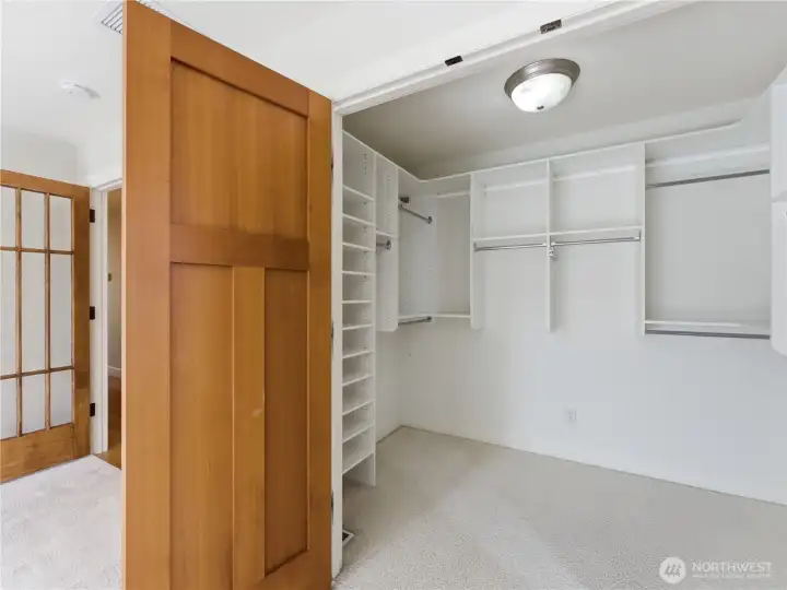 Primary Bedroom walk-in closet with built-ins Primary Bedroom walk-in closet with built-ins