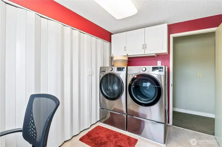 Laundry room/office with lots of storage space