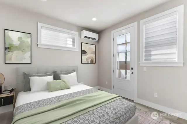 Virtual staging.  Lower level bedroom / office has it's own entry door, mini-split for heating/cooling, a large walk-in closet, and own 3/4 bathroom!