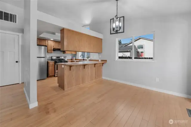 Room for stools a the breakfast bar.