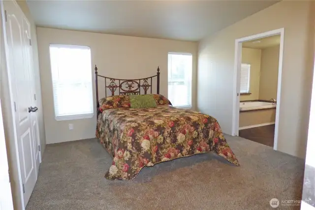Nice sized primary bedroom with double door closet.