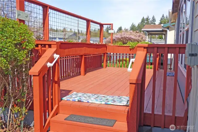 Great porch to sit and relax. Flower boxes will be in bloom before too long.