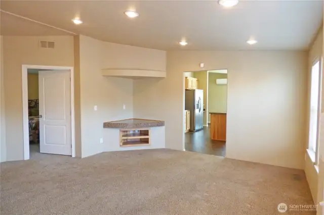 The other side of the living room with great spot for tv.