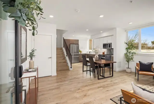 Immaculate townhome flooded with natural light on all levels. Opens to a very spacious open floor plan with plenty of room for living room, large couch, entertaining and dining.