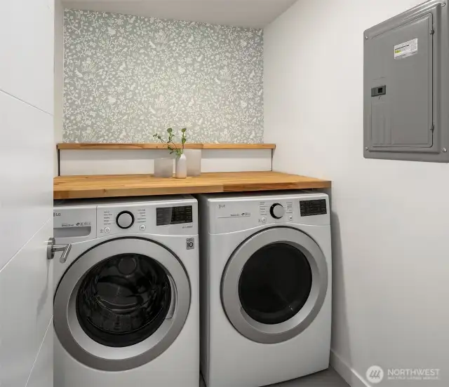 Laundry room with built in folding table.