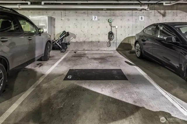 Large parking spot in secure garage with extra space for a bike or more storage. A EV charger already installed and ready to go.