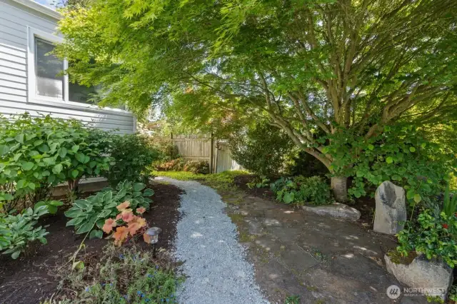 Various Conversation and Seating Area in Landscaped Yard