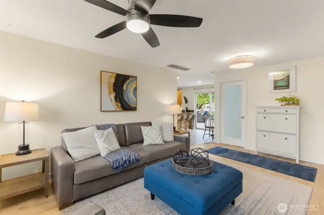 Garage access to right (off camera) and frosted door is bonus space/den with window perfect for office.