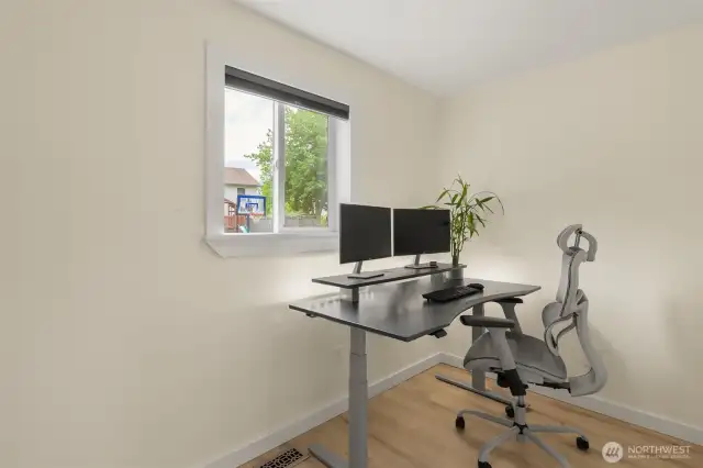 Bonus space/den with window off family room.