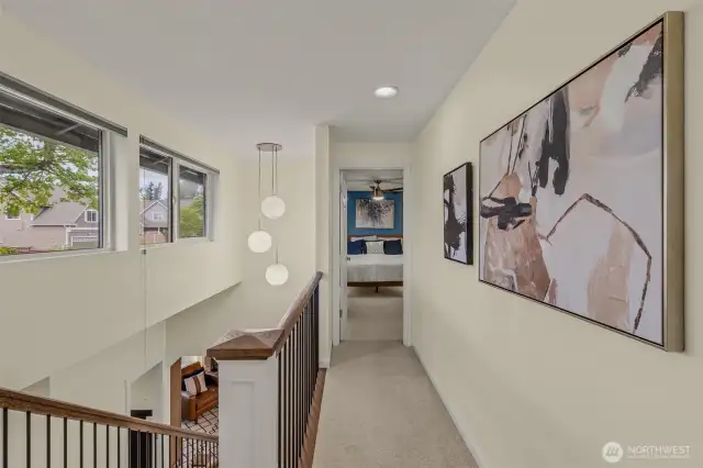 Windows over front door illuminate 2nd story landing with natural light.