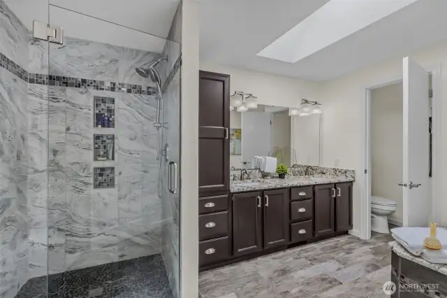 5-piece ensuite primary bathroom. Cabinets painted spring 2025.