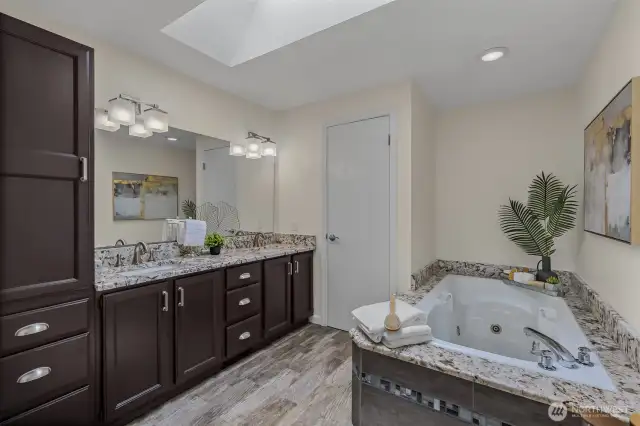 5-piece ensuite primary bathroom. Cabinets painted spring 2025.