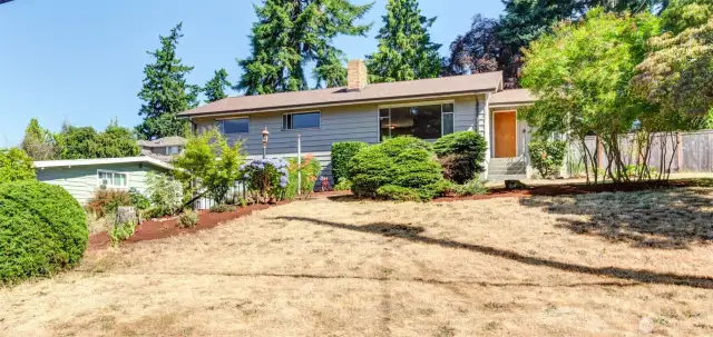 Main level with 3 bedrooms & downstairs basement W/ family room.