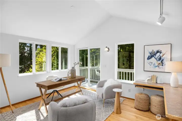 Head upstairs to the primary suite loft; vaulted ceilings, built in desk and sliding door leads to the upper level deck. A multi-functional space for work or to relax and unwind.