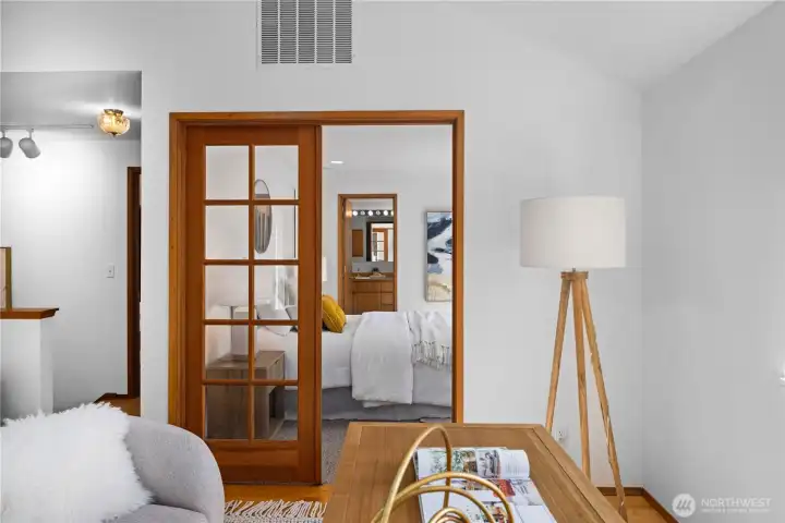 French doors lead to the primary suite.