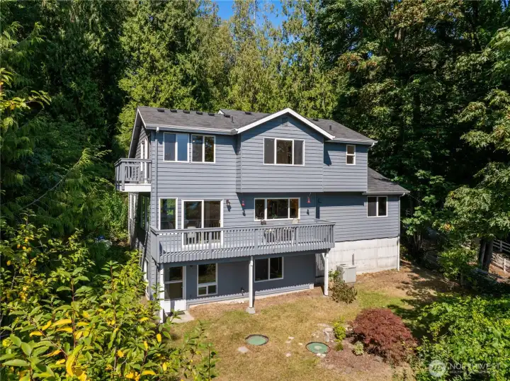 Looking back toward the house and backyard garden-level and ready for your creativity. To the left is the additional tax lot - privacy in perpetuity!