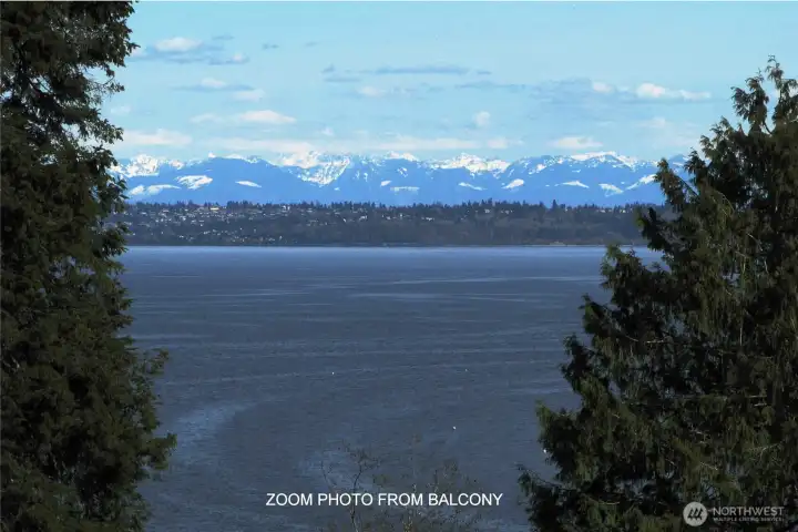 The seller is a photographer and took the following photos from the upper deck - on clear days you can see the Olympics mountains.