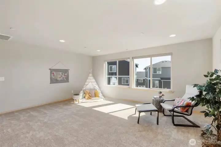 Sunlit loft ideal for working, streaming, or relaxing.