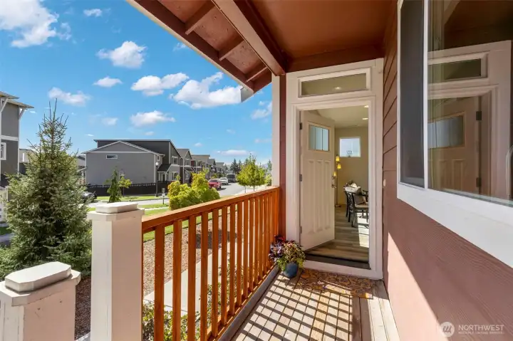 Relax on the charming porch with neighborhood views.