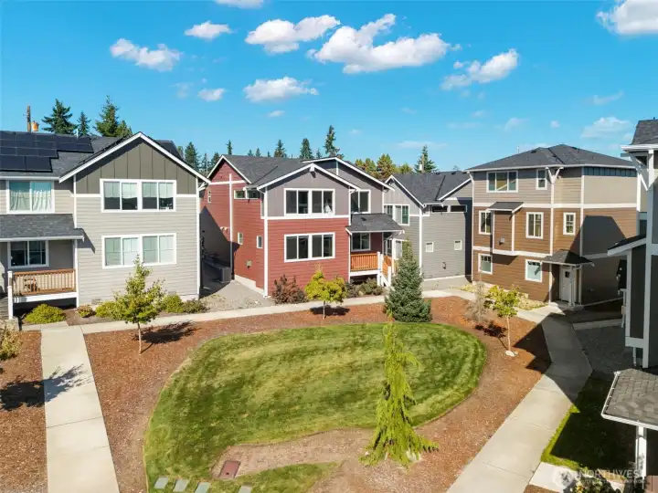 Community courtyard with green space just outside your door.