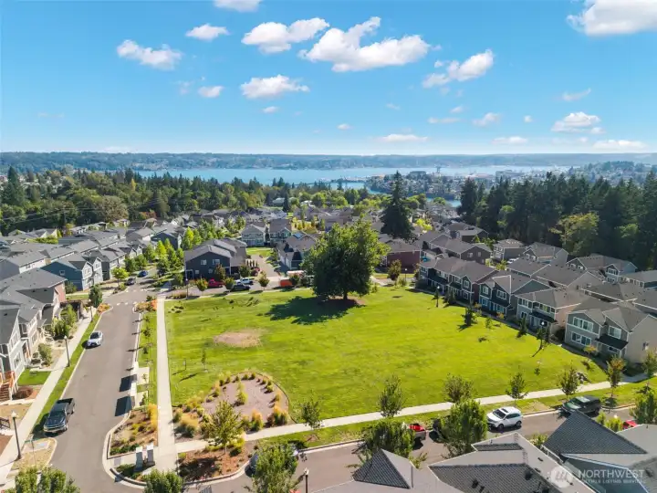 Aerial view highlighting parks and waterfront nearby.