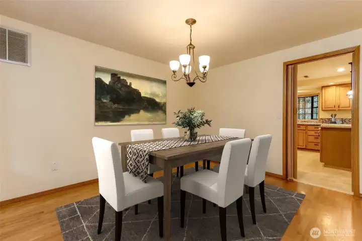 Formal dining room on Main - Image has been virtually staged